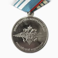 Изображение награды : знак "100 лет международному полицейскому сотрудничеству"